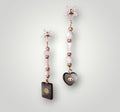 Pendientes de la colección: Nácar, ojo y sol